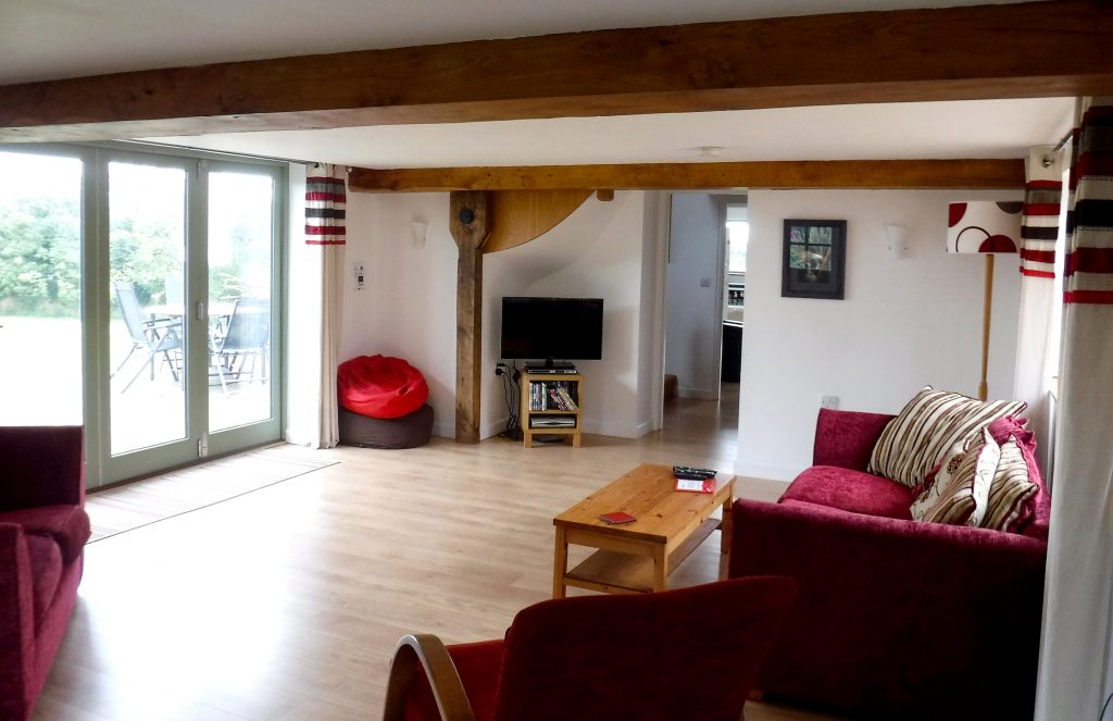The Sitting Room Looks Out onto the East Facing Deck